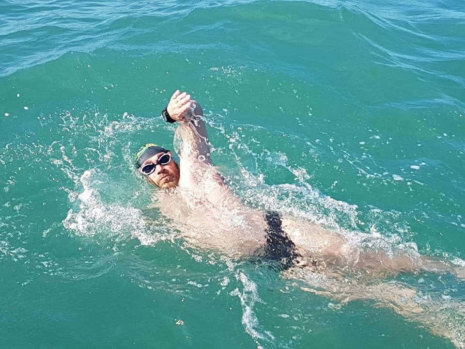 Romanian librarian succesfully swims across the English Channel