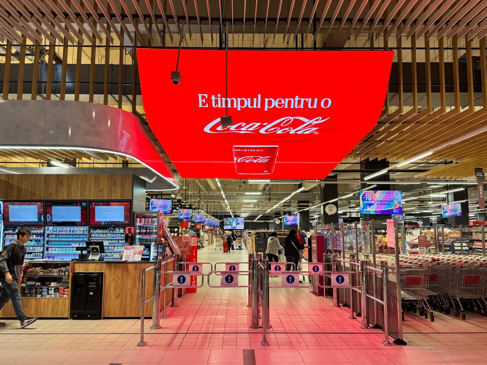 The curved LED screen at the store entrance
