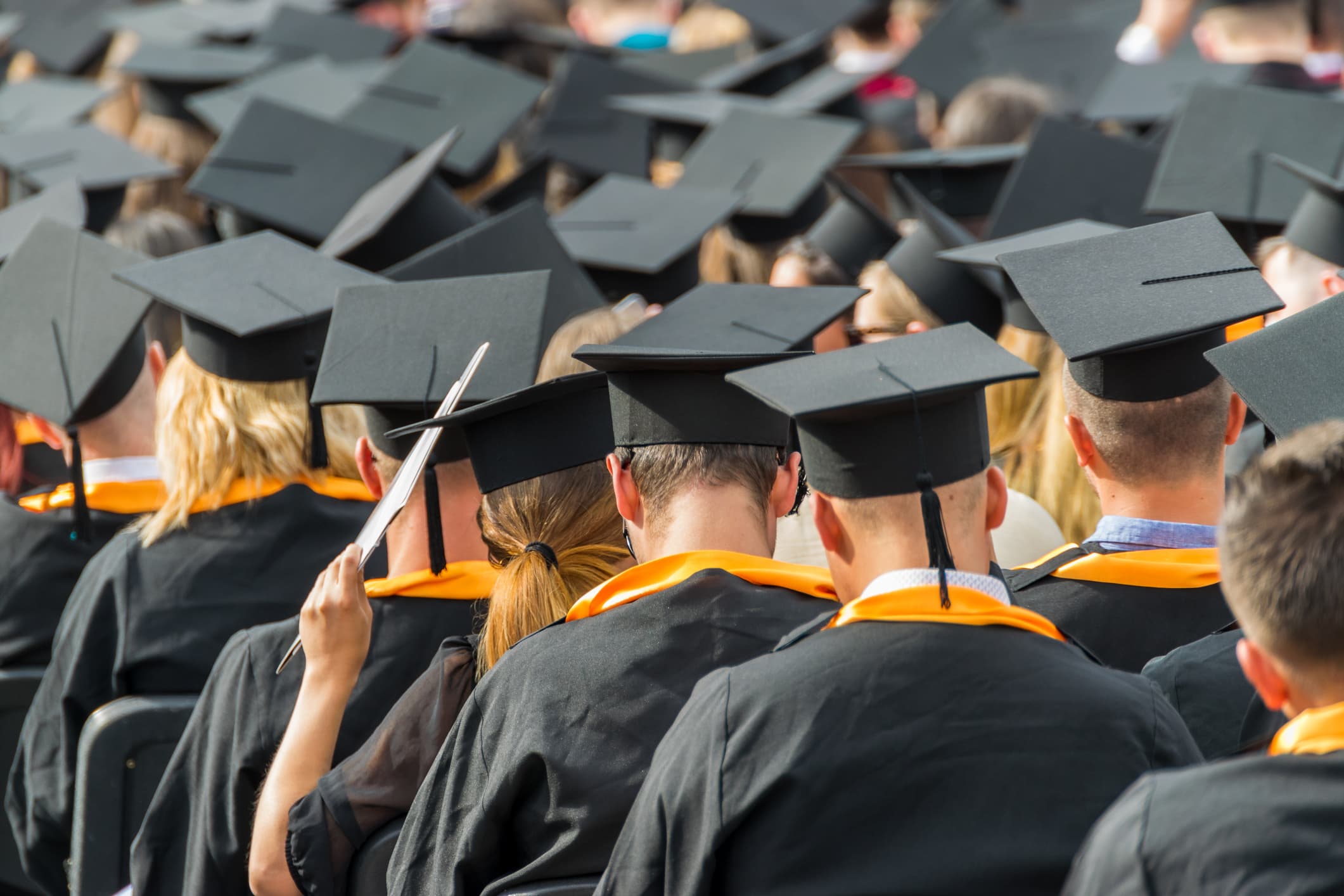 University graduates at graduation day