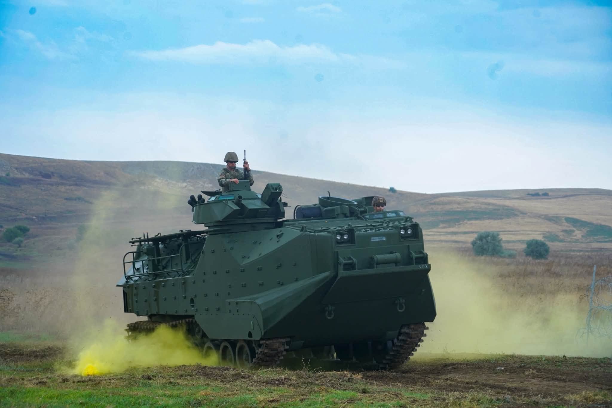 Training with an AAV-7 amphibious assault vehicle in Romania.