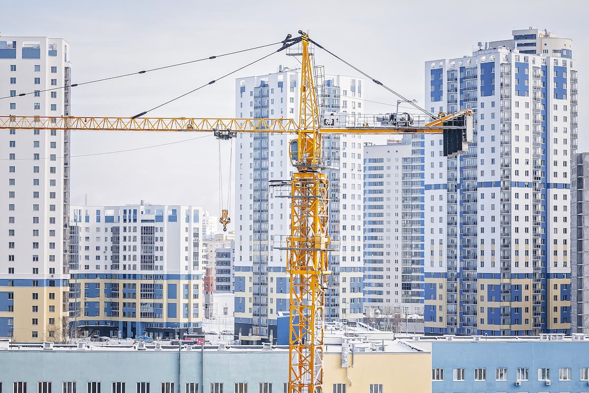 Construction site with buildings in the background - illustration.