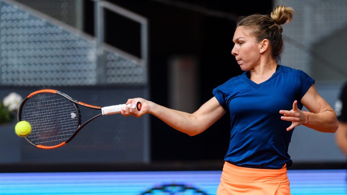 Romania’s Simona Halep wins second Madrid title after exhausting final