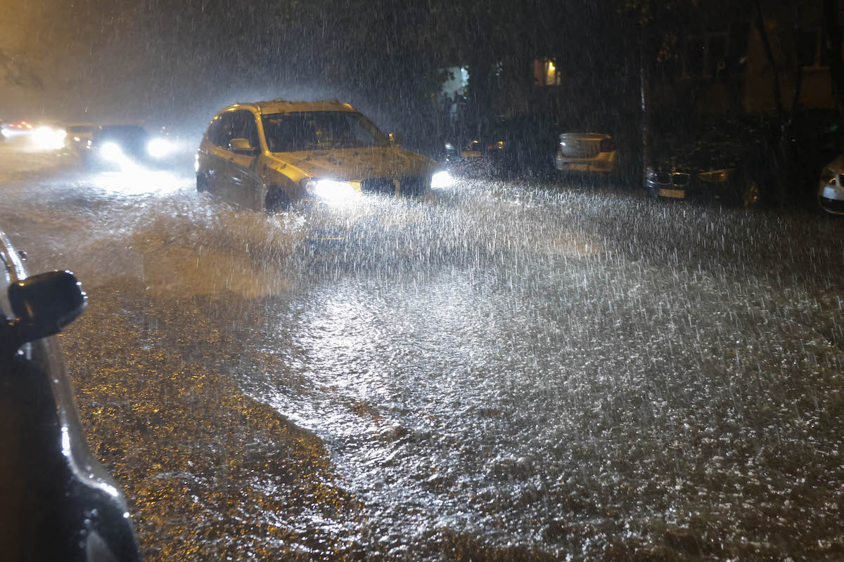 Streets flooded, cars damaged and flights diverted as ‘code red’ storm hits Bucharest